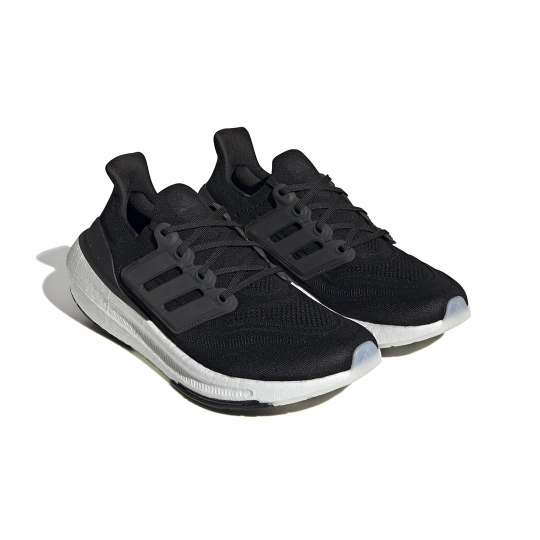 adidas - Unisex Ultraboost Light Shoes (GY9351) outdoor sports lover running in a boardwalk area shoes